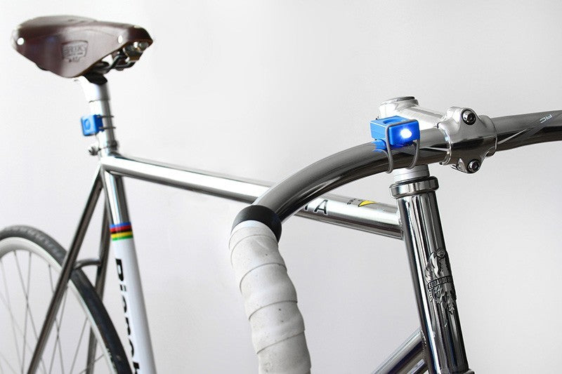 Pair of blue Bookman bicycle lamps