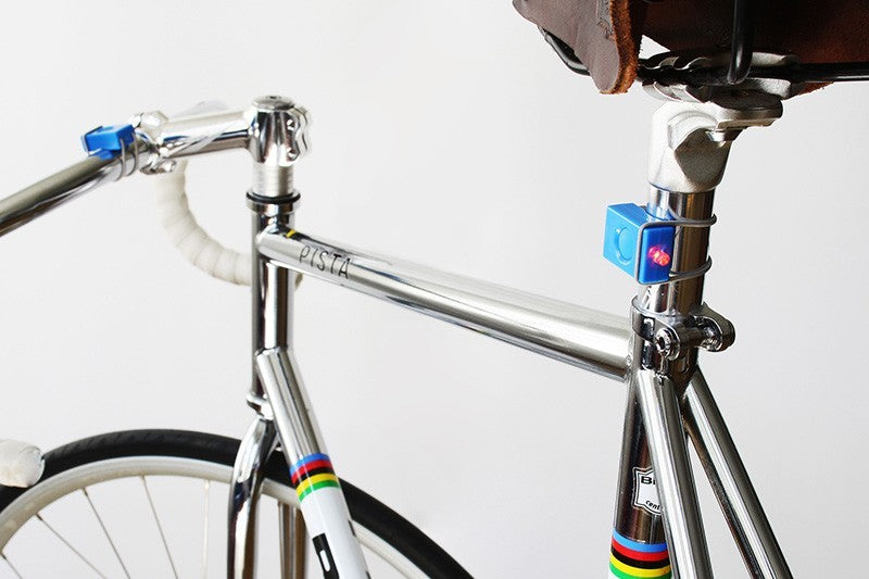 Pair of green Bookman bicycle lamps