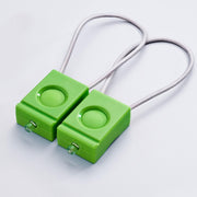 Pair of green Bookman bicycle lamps