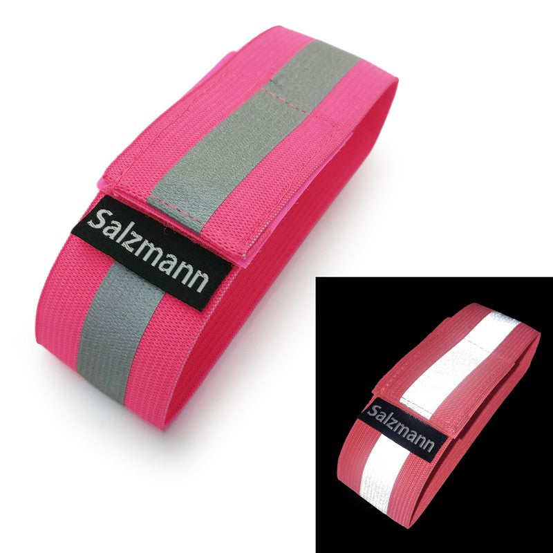 Paar fluoreszierende rosa reflektierende Armbänder von Salzmann