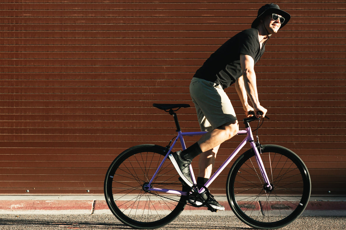 State Bicycle Co. Core-Line Lavender Haze, right side lifestyle shot