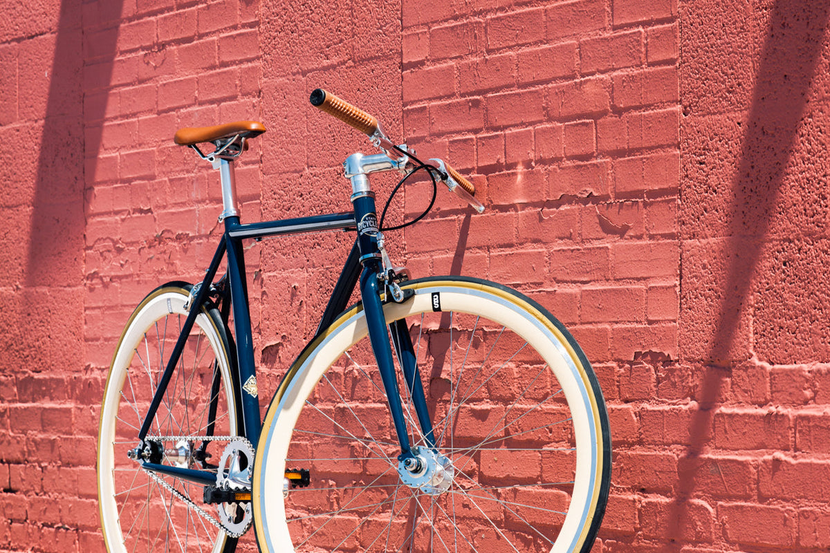State Bicycle Co. Core-Line Rigby navy blue city bike, lifestyle shot