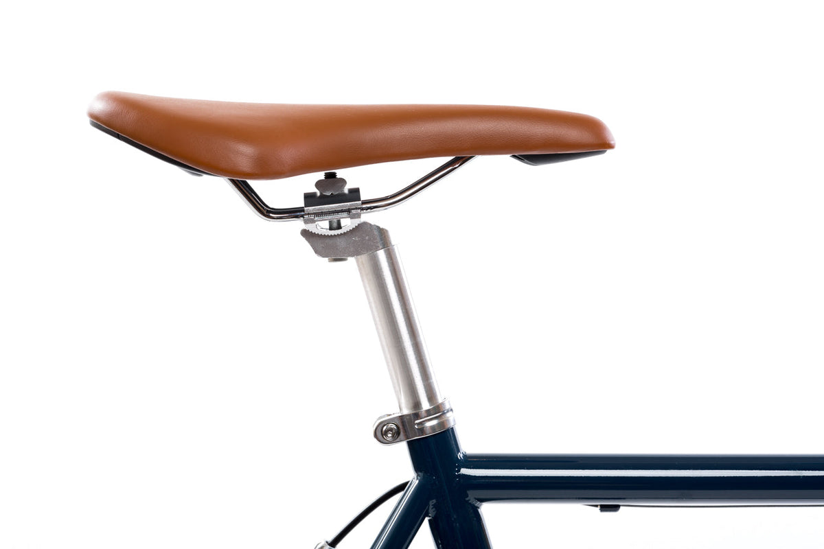State Bicycle Co. Core-Line Rigby brown synthetic leather saddle detail