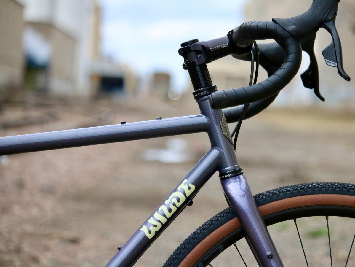 Wilde Wayfinder carbon fork in Charcoal Disco with three-pack mounts and internal routing