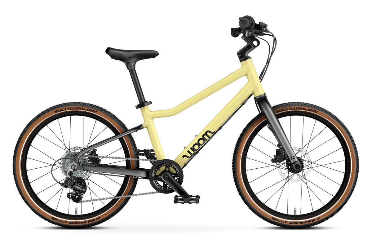 WOOM Explore 4 Mellow Yellow 20-inch kids bike side view
