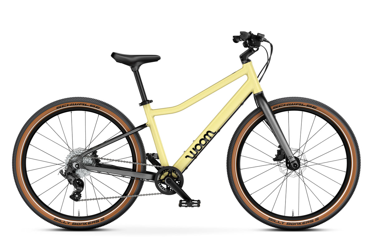 WOOM Explore 5 Mellow Yellow 24-inch kids bike side view