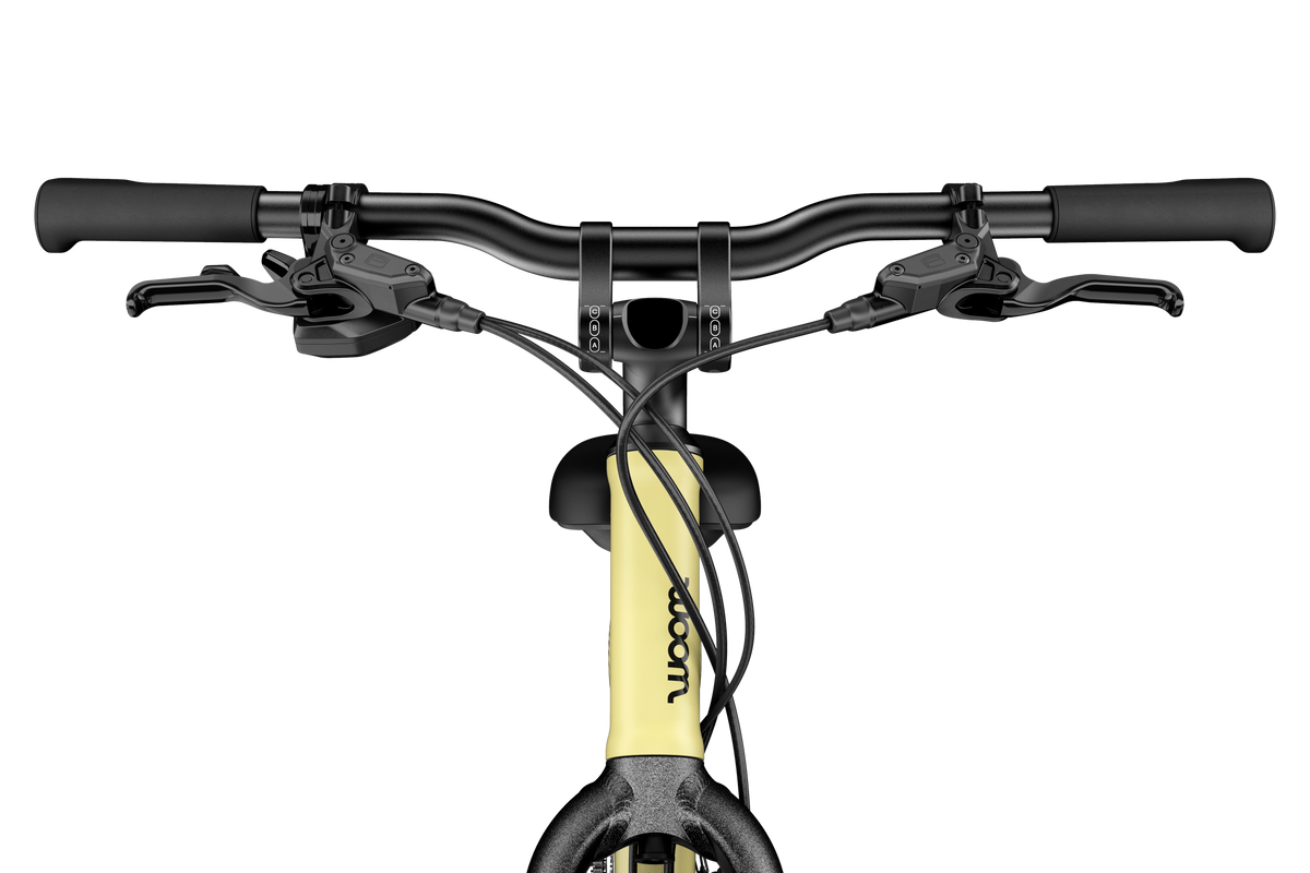 WOOM Explore 6 Mellow Yellow 26-inch kids bike front view
