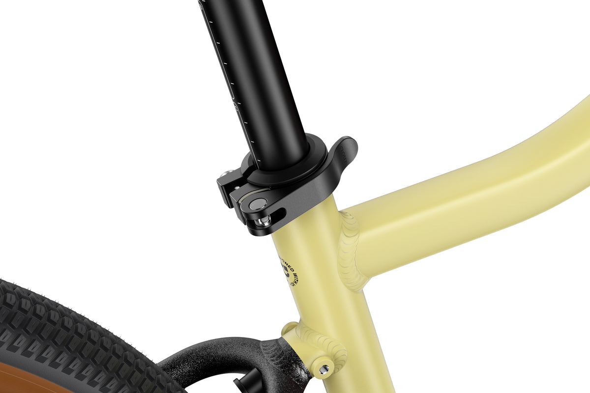 WOOM Explore 6 Mellow Yellow quick-release seatpost clamp detail