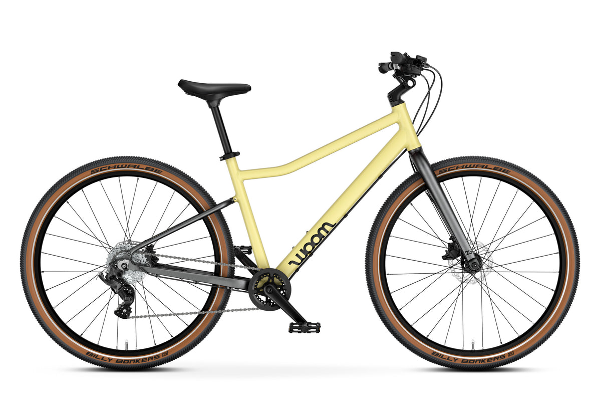 WOOM Explore 6 Mellow Yellow 26-inch kids bike side view